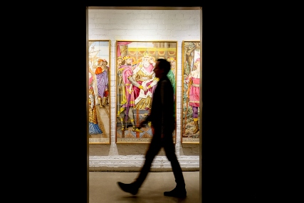 Person walking through exhibit at Jack Tile Museum